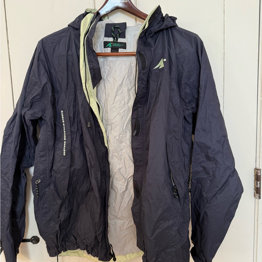 Eastern Mountain Sports women’s Black “packable” Raincoat.